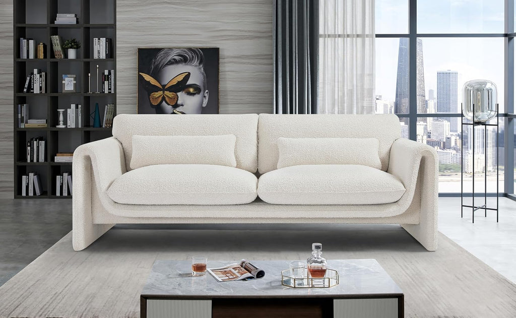 Cream boucle sofa with curved arms