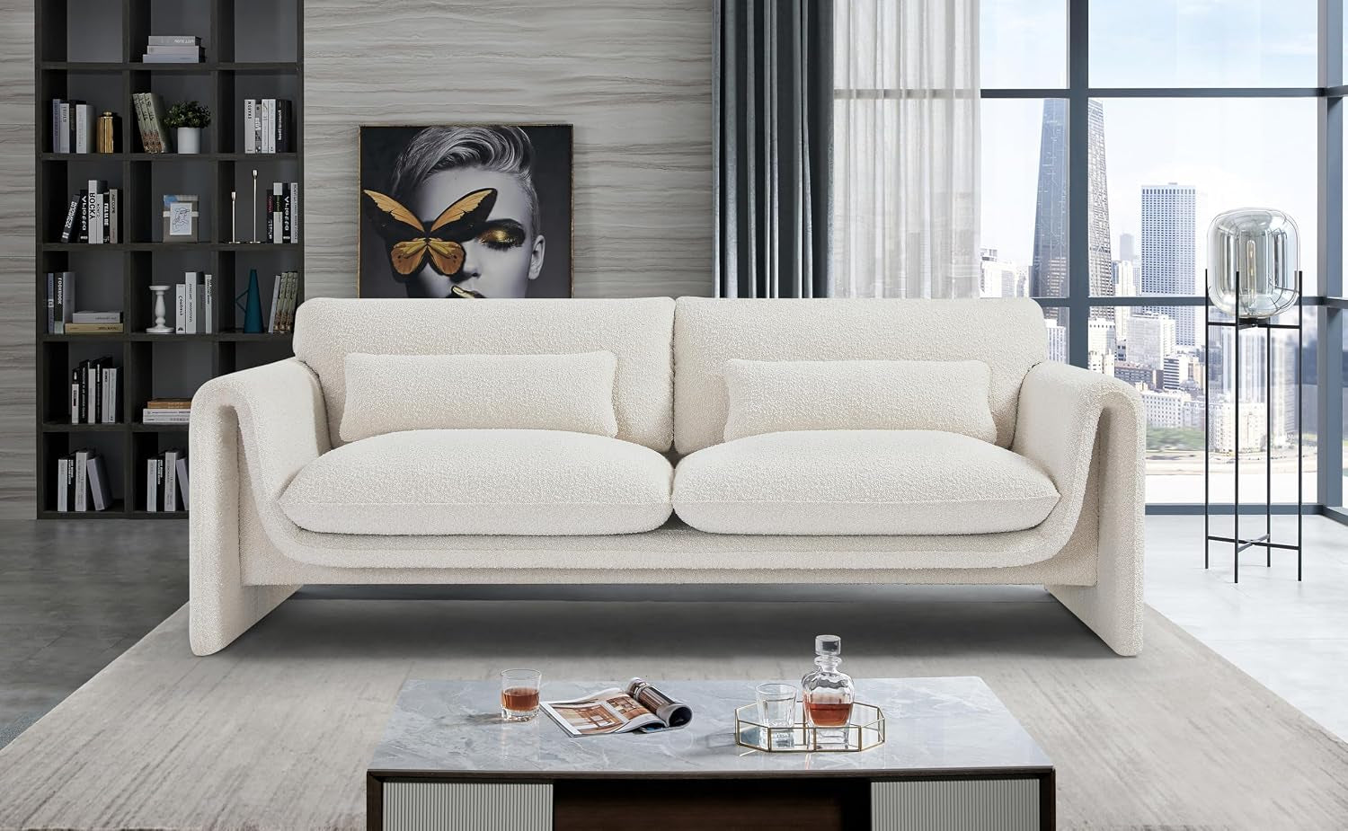 Cream boucle sofa with curved arms