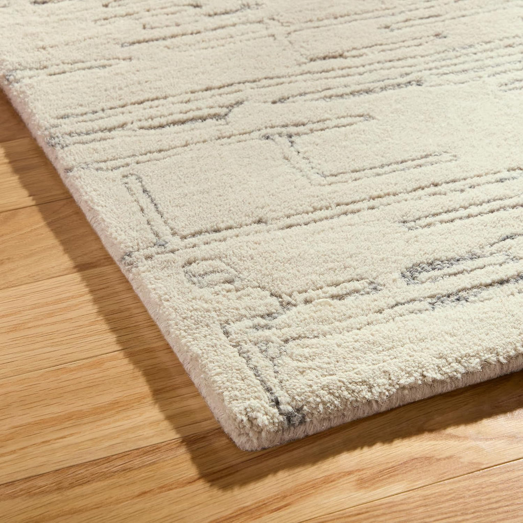 Beige and blue abstract wool area rug