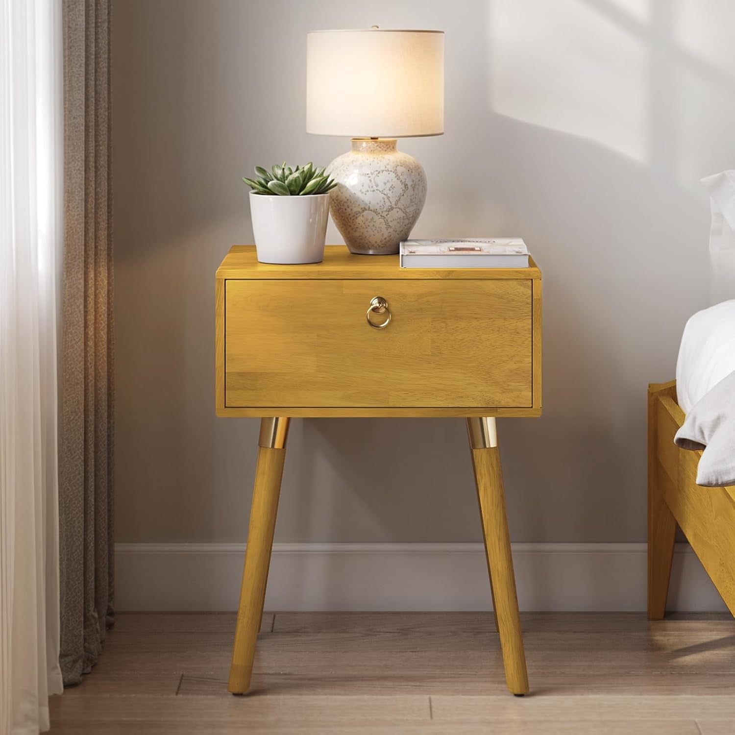 Golden natural wood nightstand with drawer