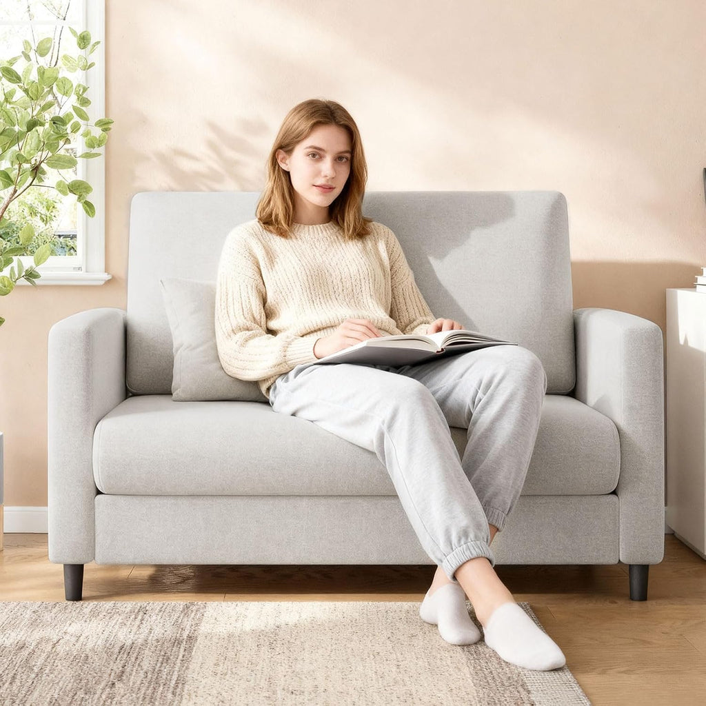 Beige mid century loveseat sofa