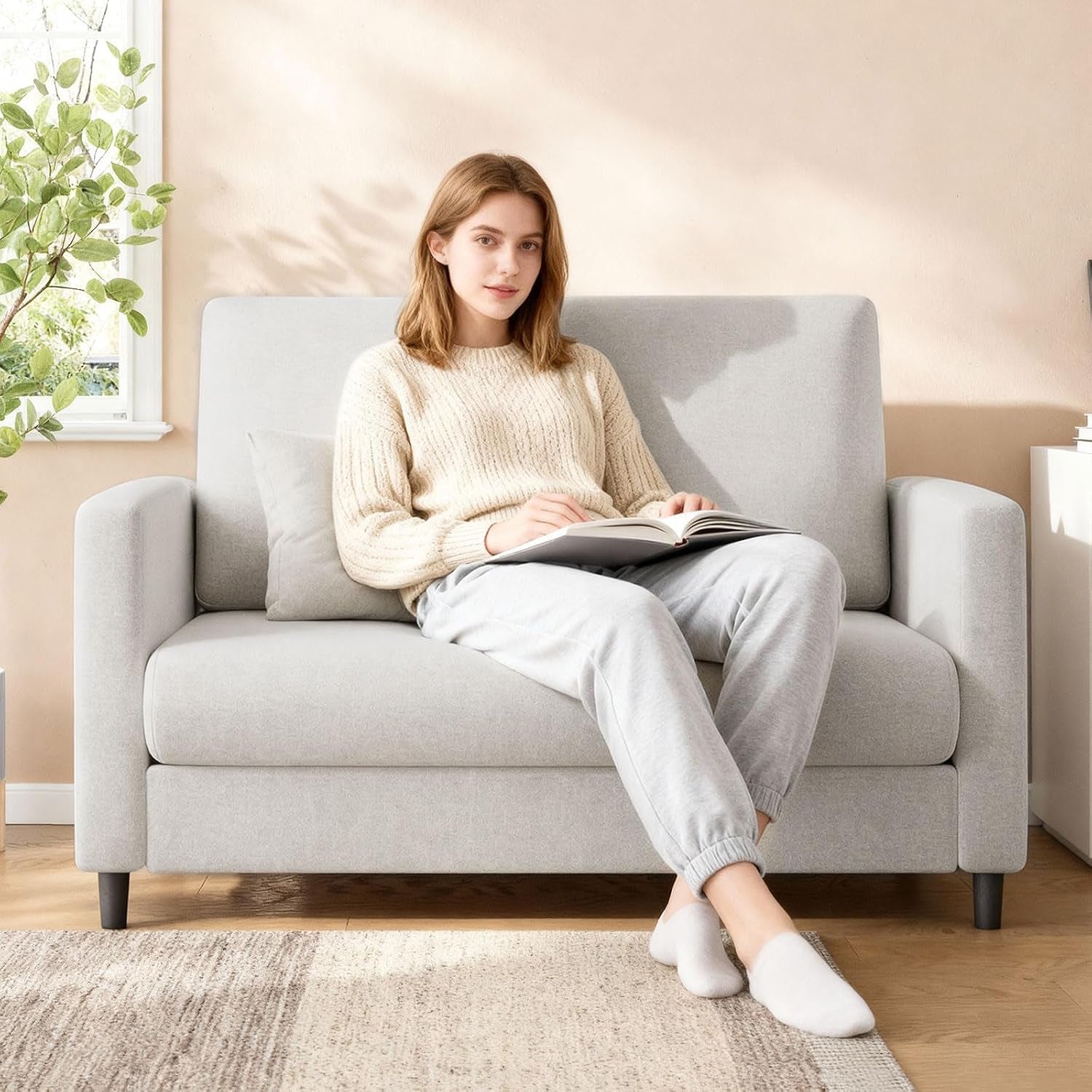 Beige mid century loveseat sofa