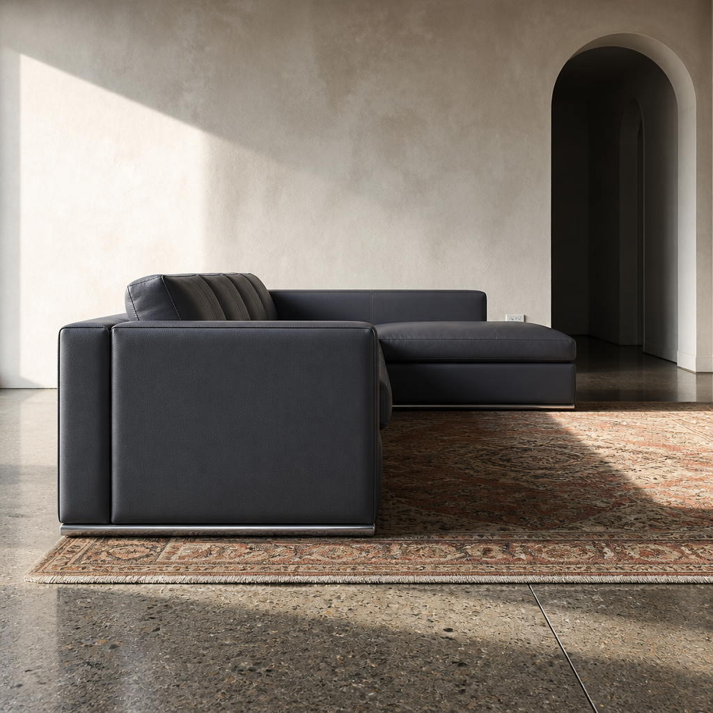 Side profile of the Surton sectional showing the low seat line and chaise return
