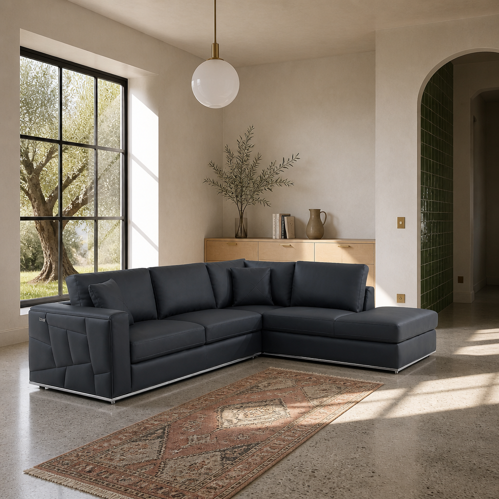Wide view of the Surton sectional in an open plan living room with oak joinery and an arched opening