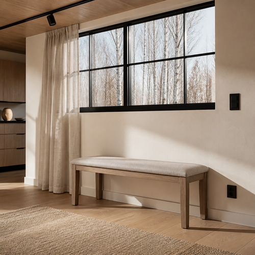 Blair wood bench against a plaster wall beneath black steel windows in a Nordic oak interior