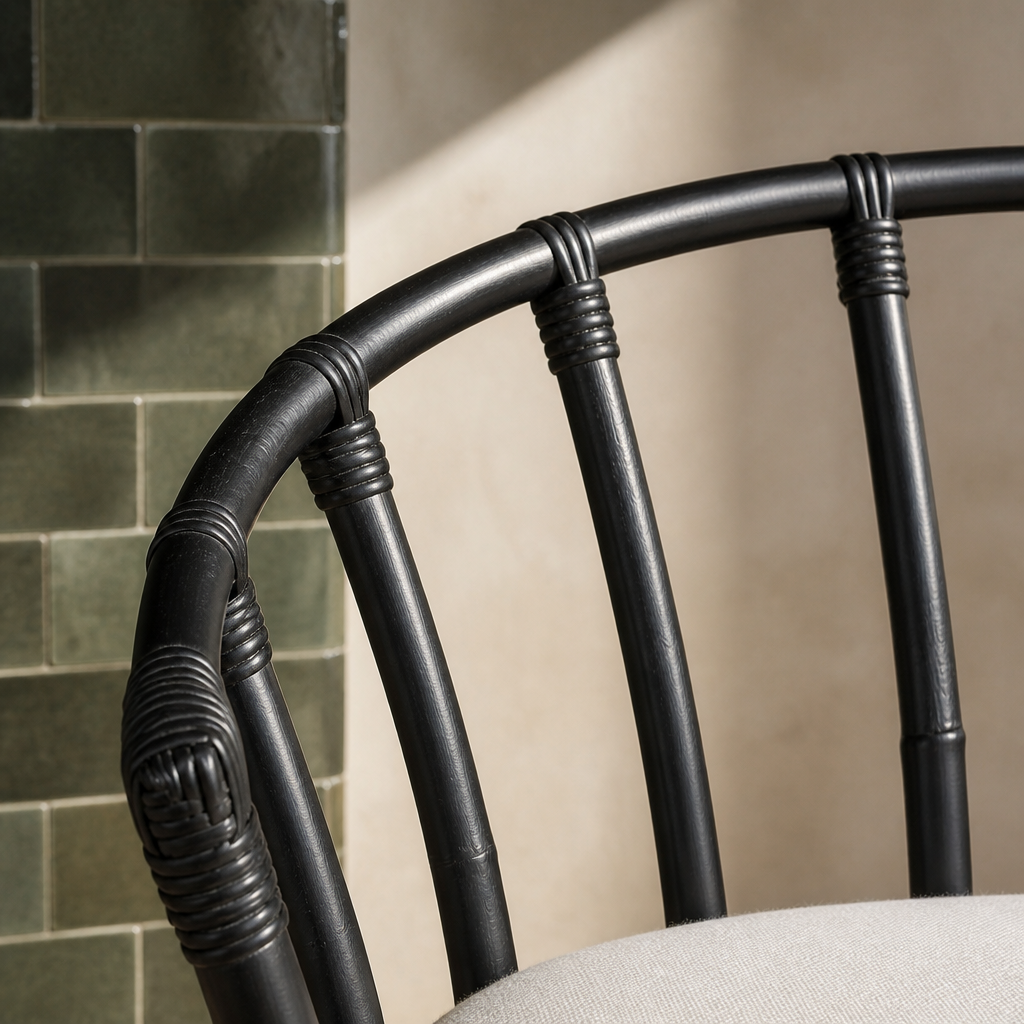 Macro of the wrapped rattan binding where the bent crest rail meets the arm