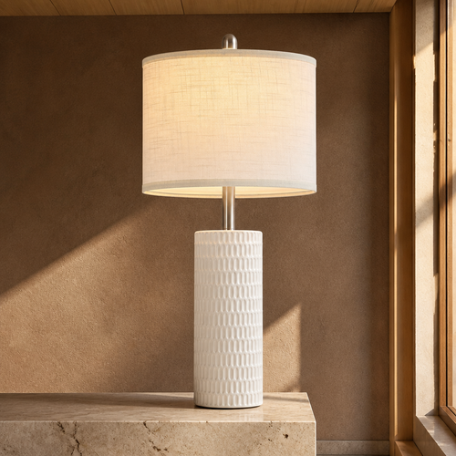 Ceramic farmhouse table lamp with carved textured white column and cream linen drum shade