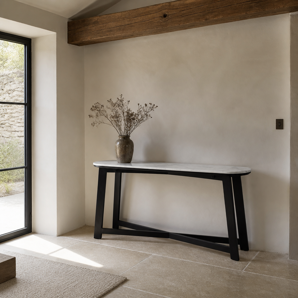 White marble console table styled in a chalk plaster and limestone hallway
