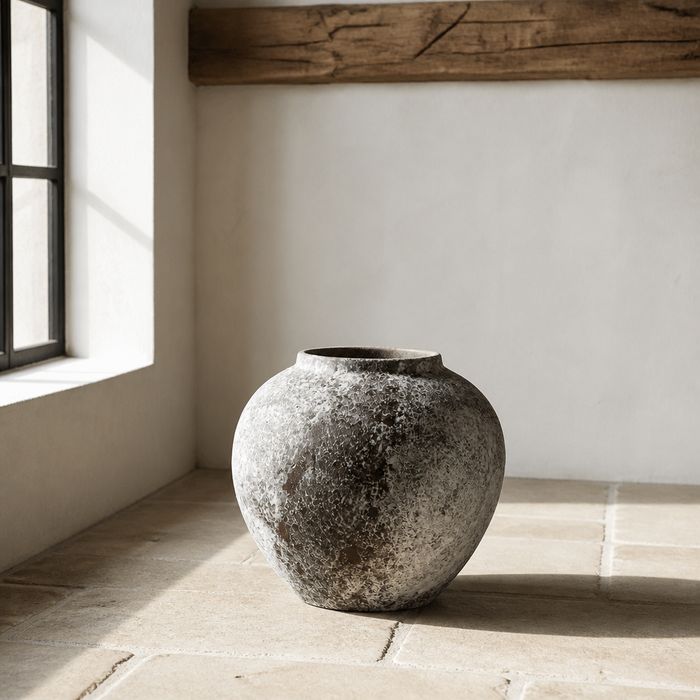 Distressed grey and rust ceramic vase, close product portrait