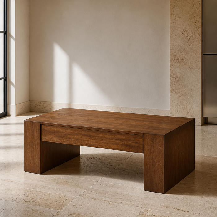 Ezra Walnut Coffee Table shown full view in a travertine gallery interior