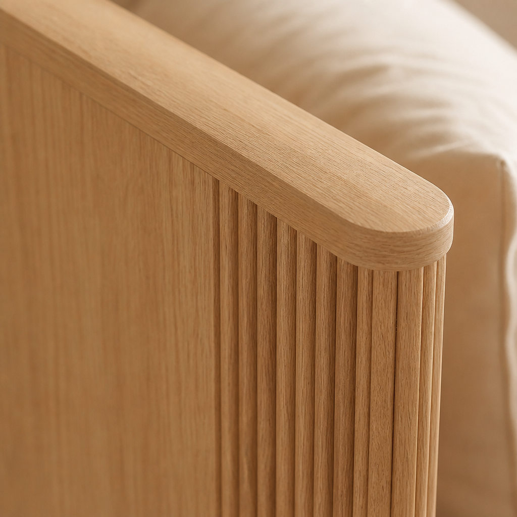 Macro detail of the rounded bullnose cap and vertical reeding on the Modern Natural Bed Frame