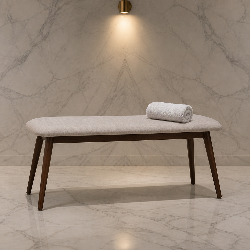 Flora Mid-Century Walnut Bench — The bench stands alone on a honed pale marble floor in front of one book matched marble slab wall