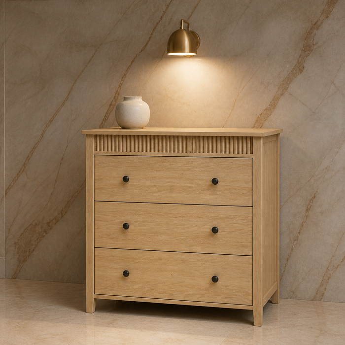 Fluted Modern Wood Nightstand — The oak chest alone against a book matched marble slab wall under a brass wall light