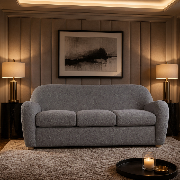 Jennifer Modern Boucle Sofa in grey boucle against a channelled upholstered wall