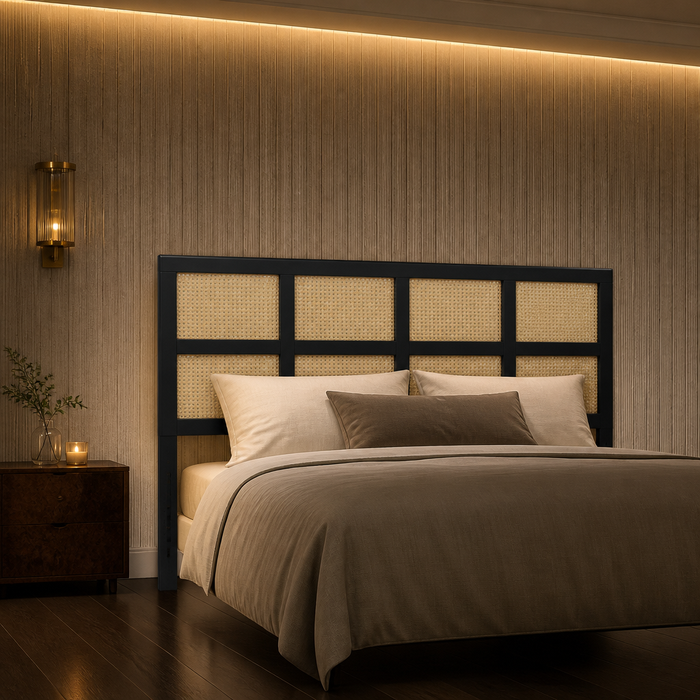 Luana Rattan Headboard in black behind a dressed bed