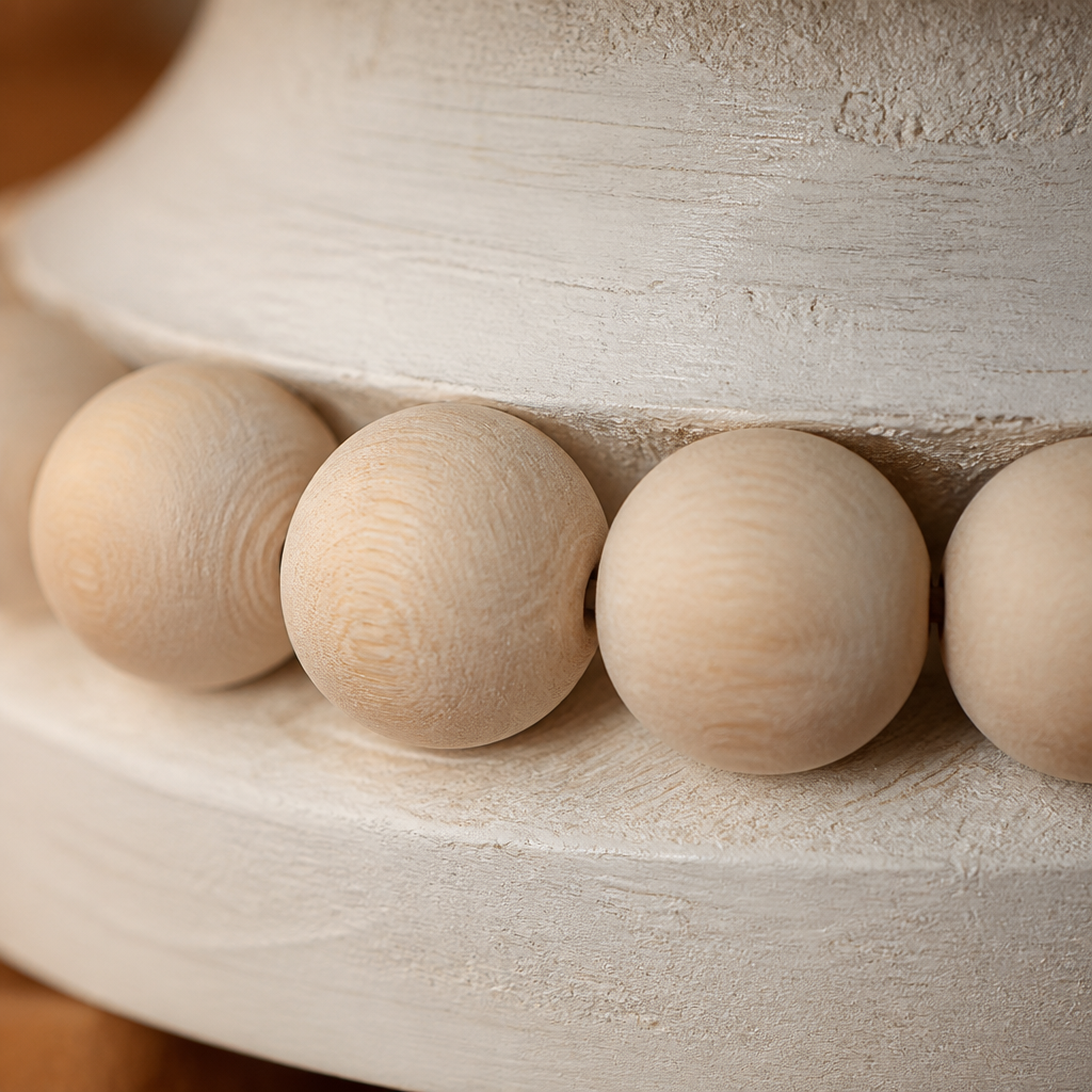 Macro of the natural wood beads and chalky white limewash on the bowl stem