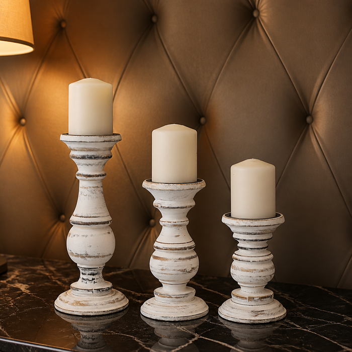 Set of three distressed mango wood candle holders hero