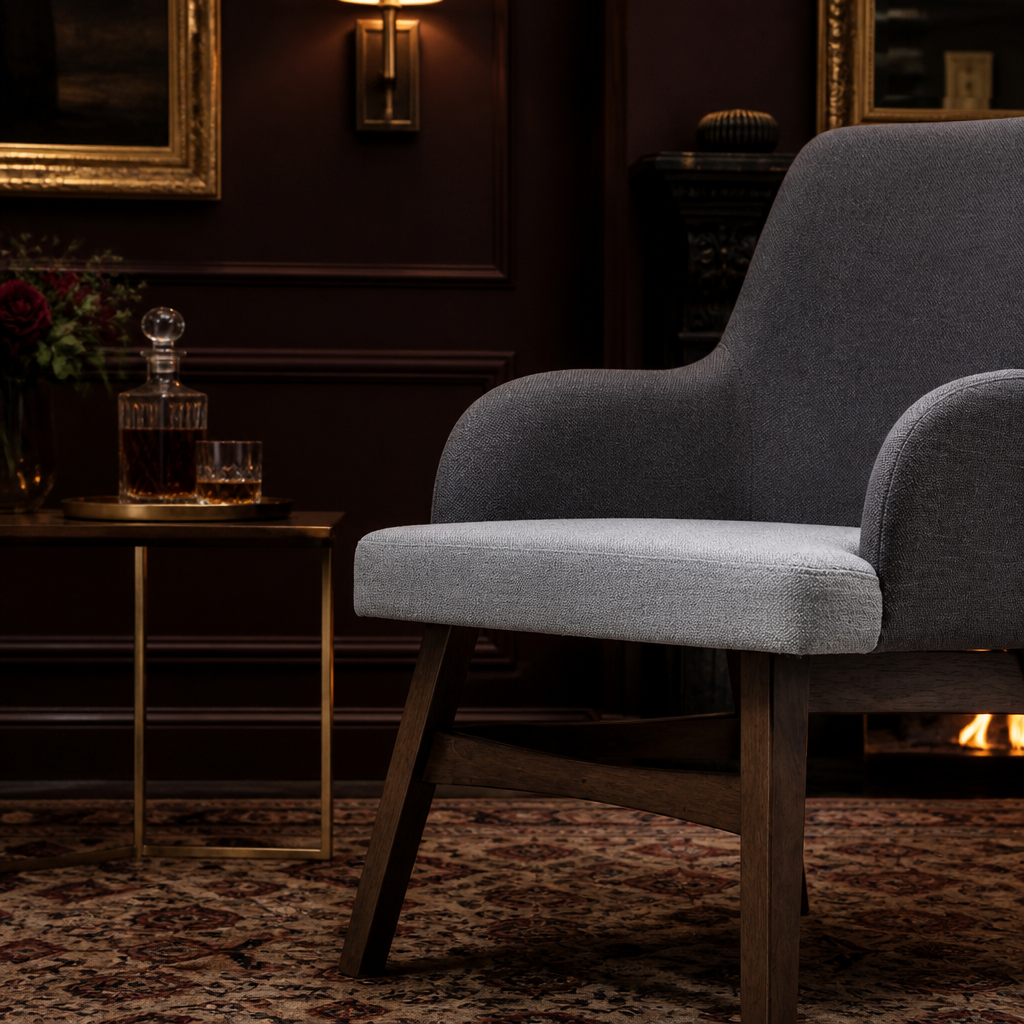 Grey accent chair curved-arm side detail