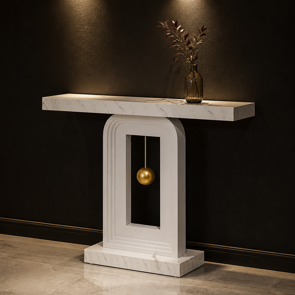 White faux-marble console with suspended gold sphere