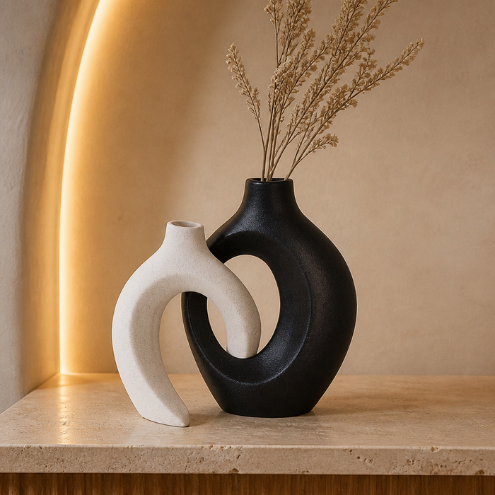 Interlocking black and off-white ceramic vase set